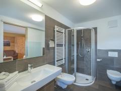 Bathroom with shower, sink, toilet and bidet
